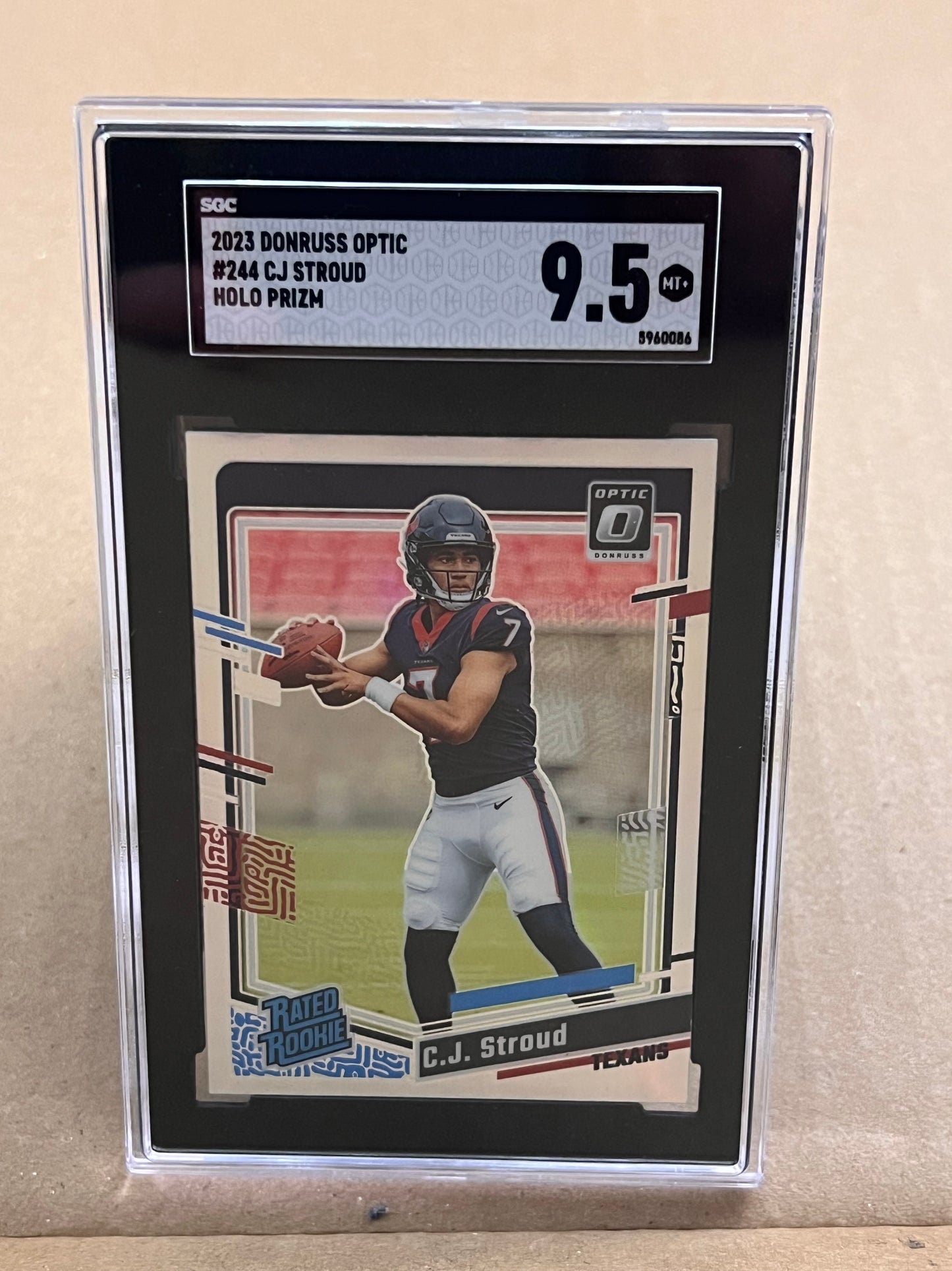 2023 Donruss Optic C.J. Stroud Rated Rookie Holo Prizm RC #244 Texans SGC 9.5